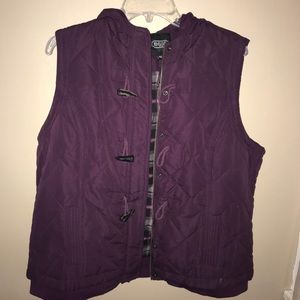 Never worn purple vest!
